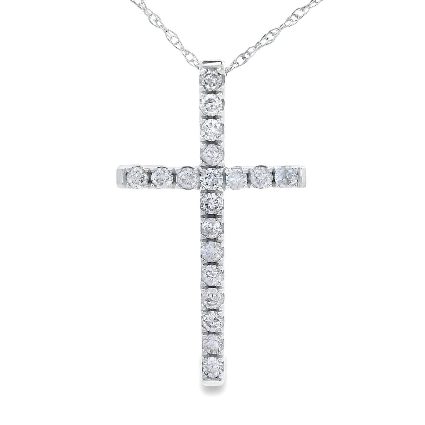 Colgante religioso de cruz con diamante de .24 qt en oro blanco de 14 kt