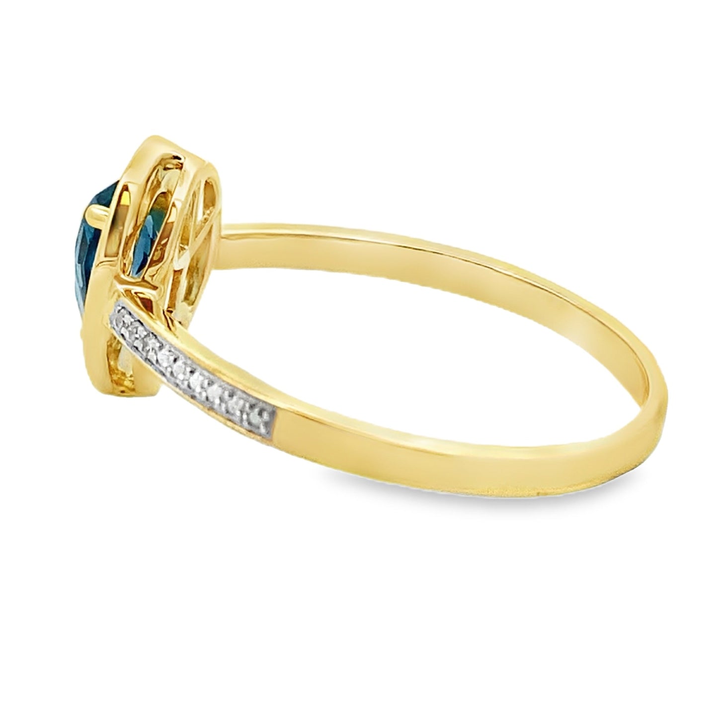 Anillo de topacio azul de Londres de 0,54 ct con diamantes y oro amarillo de 10 kt