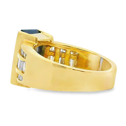 Anillo de .80ct de tanzanita y diamantes en oro amarillo de 18kt