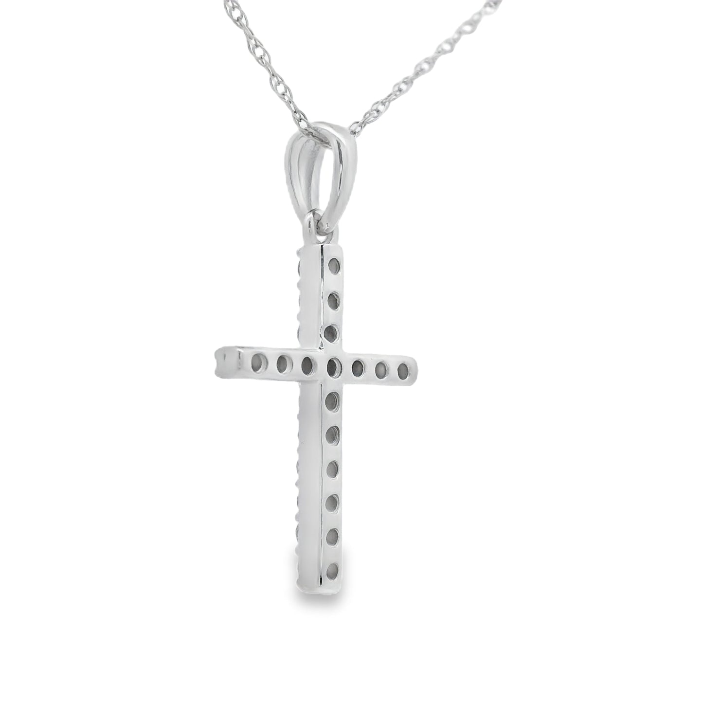 Colgante de cruz religiosa con diamante de .19 ct en oro blanco de 14 kt