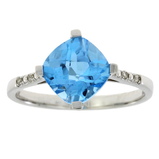 Anillo de topacio azul y diamantes de 1.20 ct en oro blanco de 10 kt