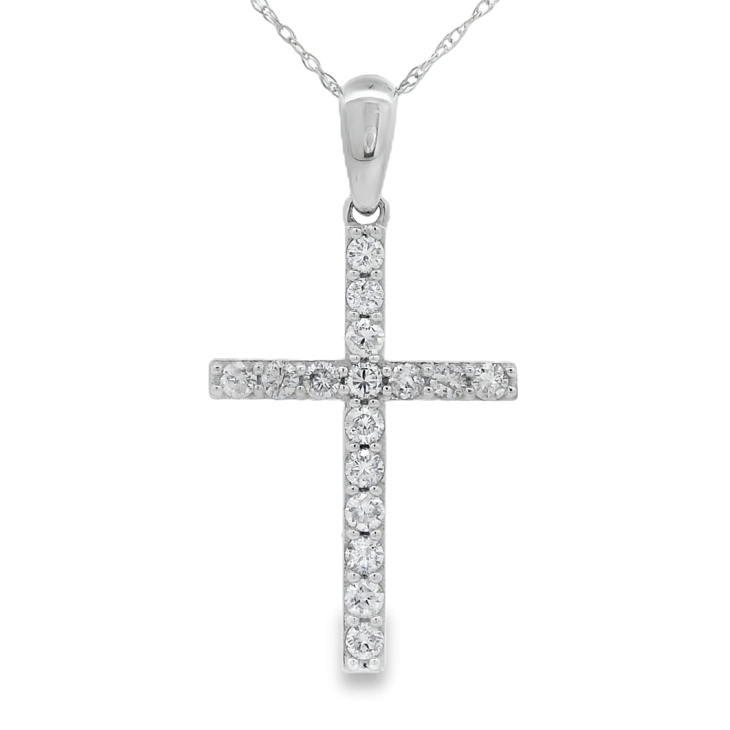Colgante religioso de cruz con diamante de .45 ct en oro blanco de 14 kt
