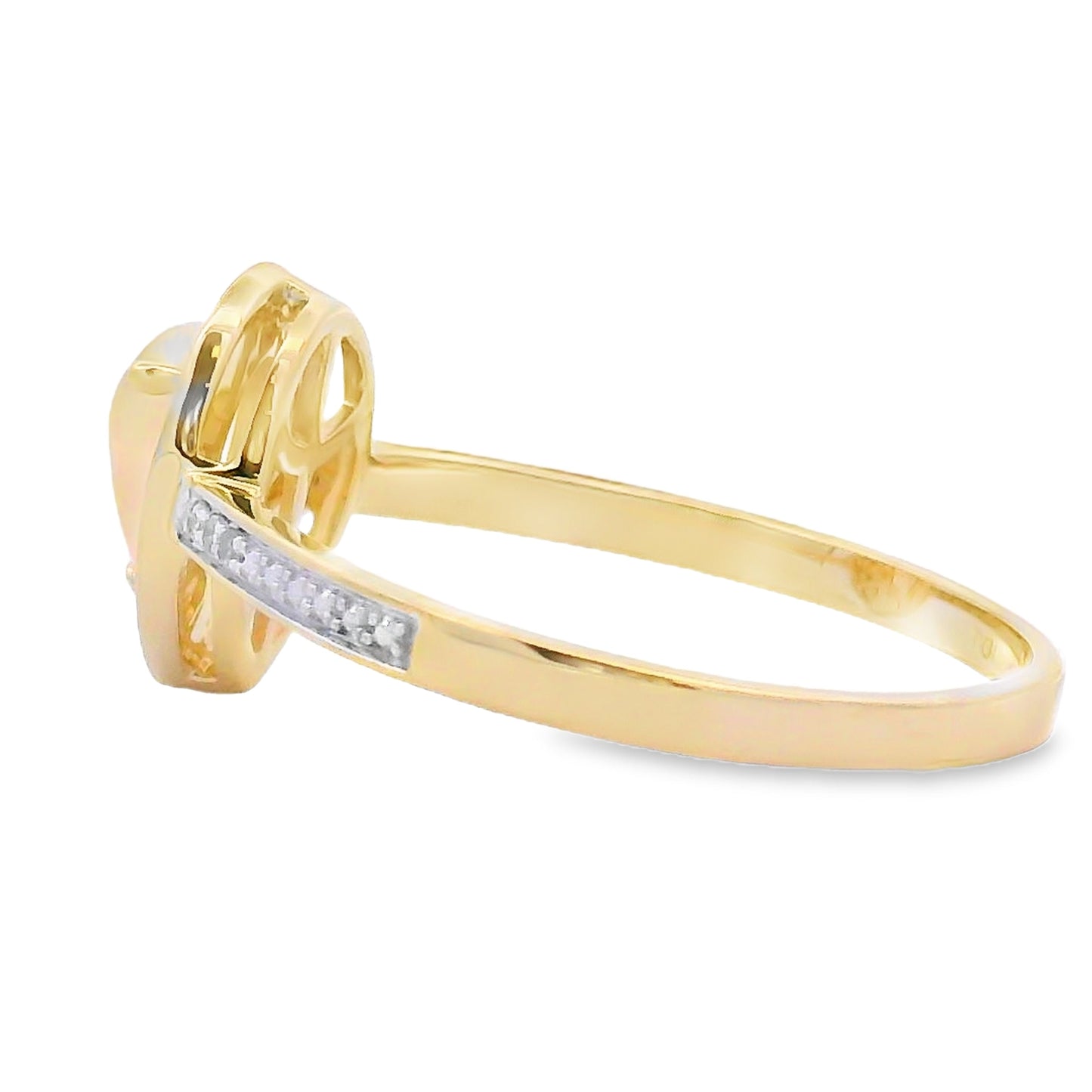 Anillo de ópalo y diamantes de .30 ct en oro amarillo de 10 kt