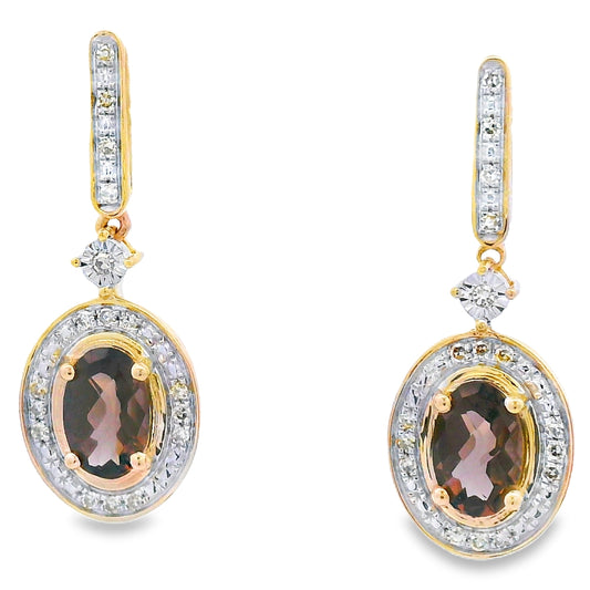 Pendientes colgantes de cuarzo y diamantes de .88 ct, oro amarillo de 10 qt