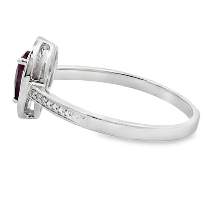 Anillo de oro blanco de 10 kt con granate y diamantes de 0,56 ct