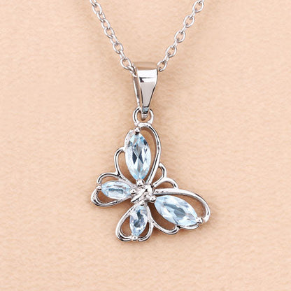 Colgante de plata de ley .925 con topacio azul genuino de 0.78 quilates