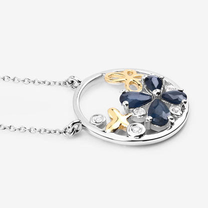 Colgante de plata de ley .925 con zafiro azul genuino de 1.41 quilates y topacio blanco