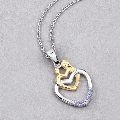 Colgante de plata de ley .925 con tanzanita genuina de 0.14 quilates