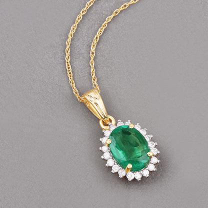 Colgante de oro amarillo de 10K con esmeralda zambiana auténtica de 1,36 quilates y diamantes blancos
