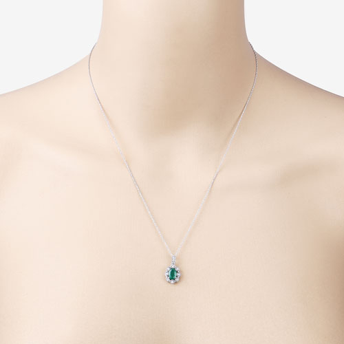 Colgante de oro blanco de 10K con esmeralda genuina de Zambia de 0,79 quilates y diamantes blancos