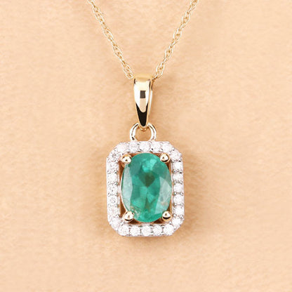 Colgante de oro amarillo de 10 quilates con esmeralda zambiana auténtica de 0,83 quilates y diamantes blancos