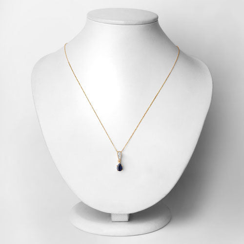 Colgante de oro amarillo de 14 quilates con zafiro azul genuino de 0.85 quilates y diamantes blancos