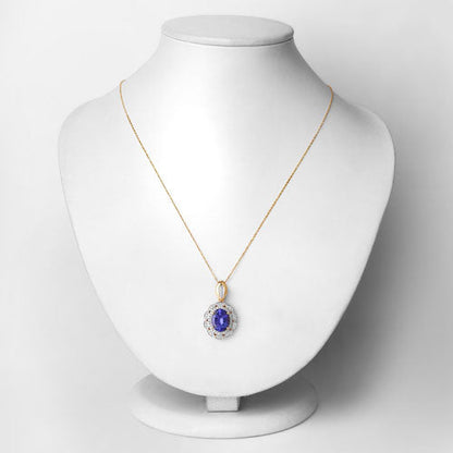 Colgante de oro amarillo de 14 quilates con tanzanita genuina de 4,13 quilates y diamantes blancos