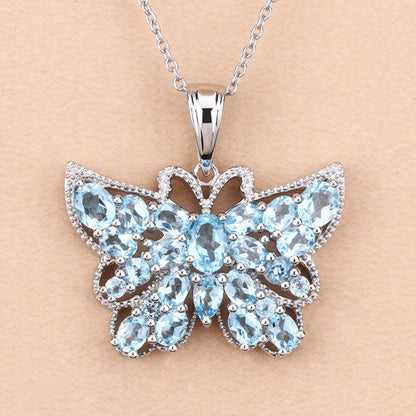 Colgante de plata de ley .925 con topacio azul suizo auténtico de 4.84 quilates