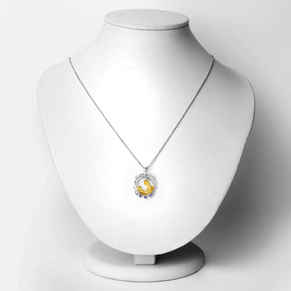 Colgante de plata de ley .925 con tanzanita genuina de 0.11 quilates