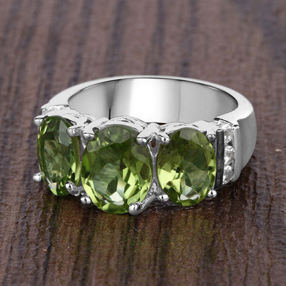 Anillo de plata de ley .925 con peridoto auténtico y topacio blanco de 4.14 quilates