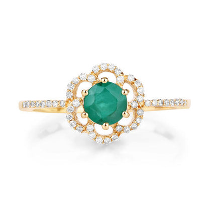 Anillo de oro amarillo de 14 quilates con esmeralda zambiana genuina de 0,55 quilates y diamante blanco