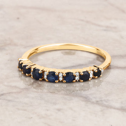 Anillo de oro amarillo de 14K con zafiro azul genuino de 0,43 quilates y diamantes blancos