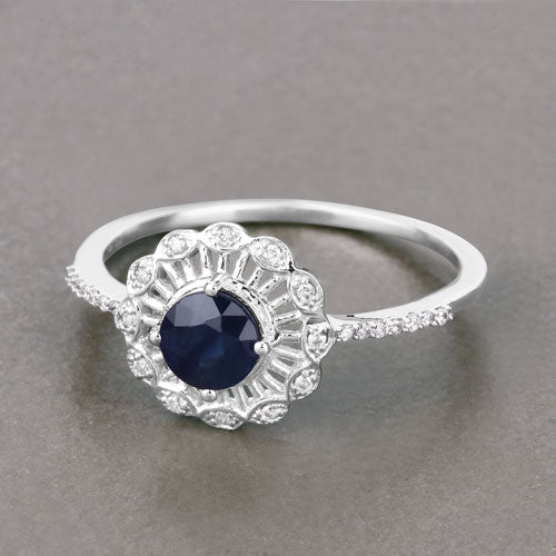 Anillo de oro blanco de 14K con zafiro azul genuino de 0.72 quilates y diamante blanco