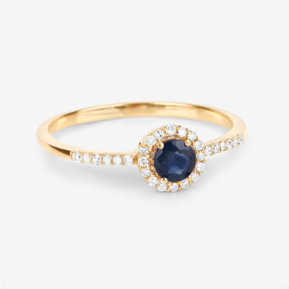 Anillo de oro amarillo de 14 quilates con zafiro azul genuino de 0,38 quilates y diamantes blancos