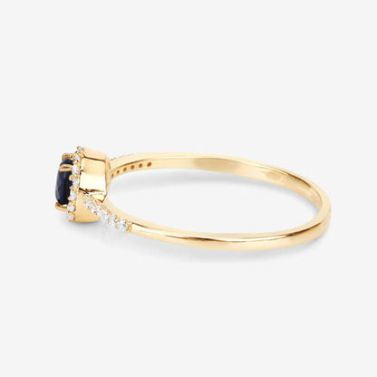 Anillo de oro amarillo de 14 quilates con zafiro azul genuino de 0,38 quilates y diamantes blancos