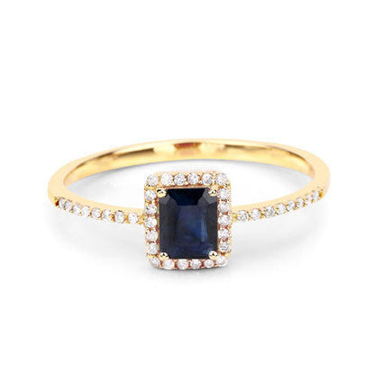 Anillo de oro amarillo de 14K con zafiro azul genuino de 0.60 quilates y diamantes blancos