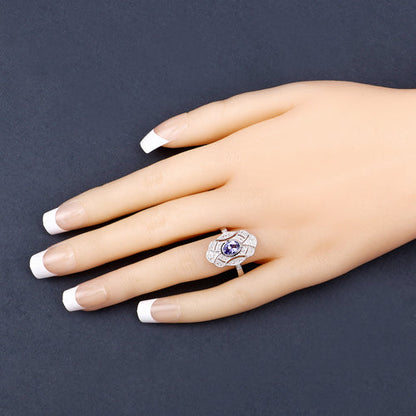 Anillo de plata esterlina .925 con tanzanita genuina de 1,17 quilates y topacio blanco