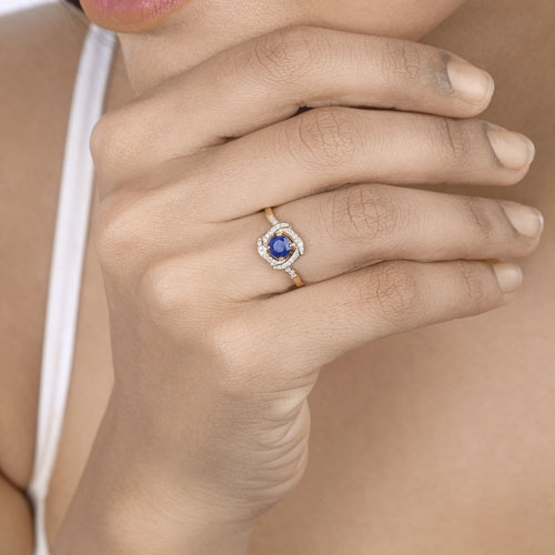 Anillo de oro amarillo de 14 quilates con zafiro azul auténtico de 0,73 quilates y diamante blanco