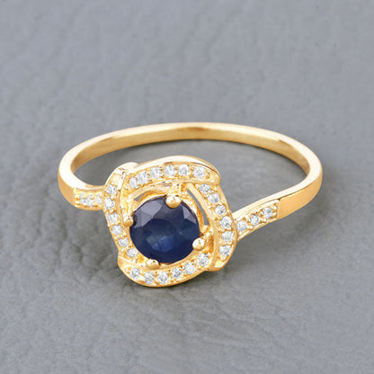 Anillo de oro amarillo de 14 quilates con zafiro azul auténtico de 0,73 quilates y diamante blanco
