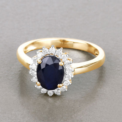 Anillo de oro amarillo de 14K con zafiro azul genuino de 1.73 quilates y diamantes blancos