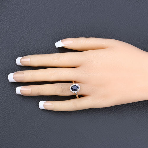 Anillo de oro amarillo de 14K con zafiro azul genuino de 1.73 quilates y diamantes blancos