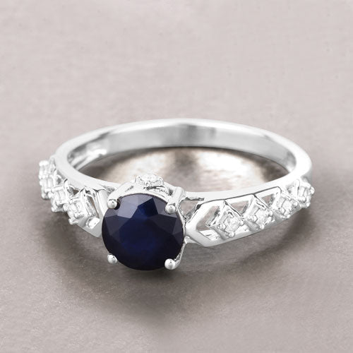 Anillo de oro blanco de 10 quilates con zafiro azul genuino de 1,13 quilates y diamantes blancos