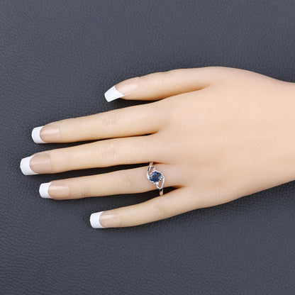 Anillo de oro blanco de 10K con zafiro azul genuino de 0.98 quilates y diamantes blancos