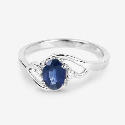 Anillo de oro blanco de 10K con zafiro azul genuino de 0.98 quilates y diamantes blancos