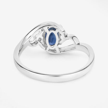 Anillo de oro blanco de 10K con zafiro azul genuino de 0.98 quilates y diamantes blancos