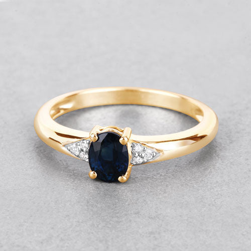 Anillo de oro amarillo de 14K con zafiro azul genuino de 0.84 quilates y diamante blanco