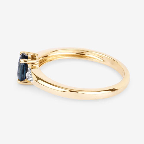 Anillo de oro amarillo de 14K con zafiro azul genuino de 0.84 quilates y diamante blanco