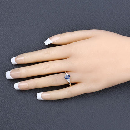 Anillo de oro amarillo de 14 quilates con zafiro azul genuino de 1,01 quilates y diamantes blancos