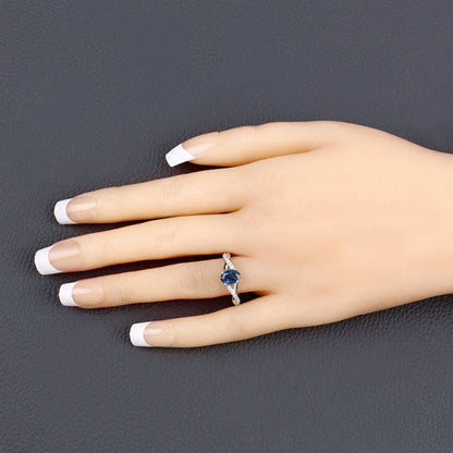 Anillo de oro blanco de 14K con zafiro azul genuino de 1.04 quilates y diamantes blancos
