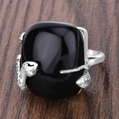 Anillo de plata de ley .925 con ónix negro auténtico de 21,04 quilates y topacio blanco