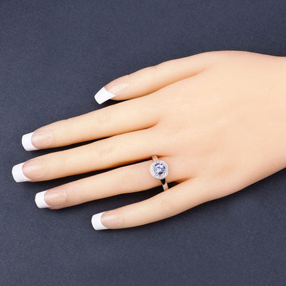 Anillo de Plata de Ley .925 con Tanzanita Genuina de 1,05 Quilates y Topacio Blanco